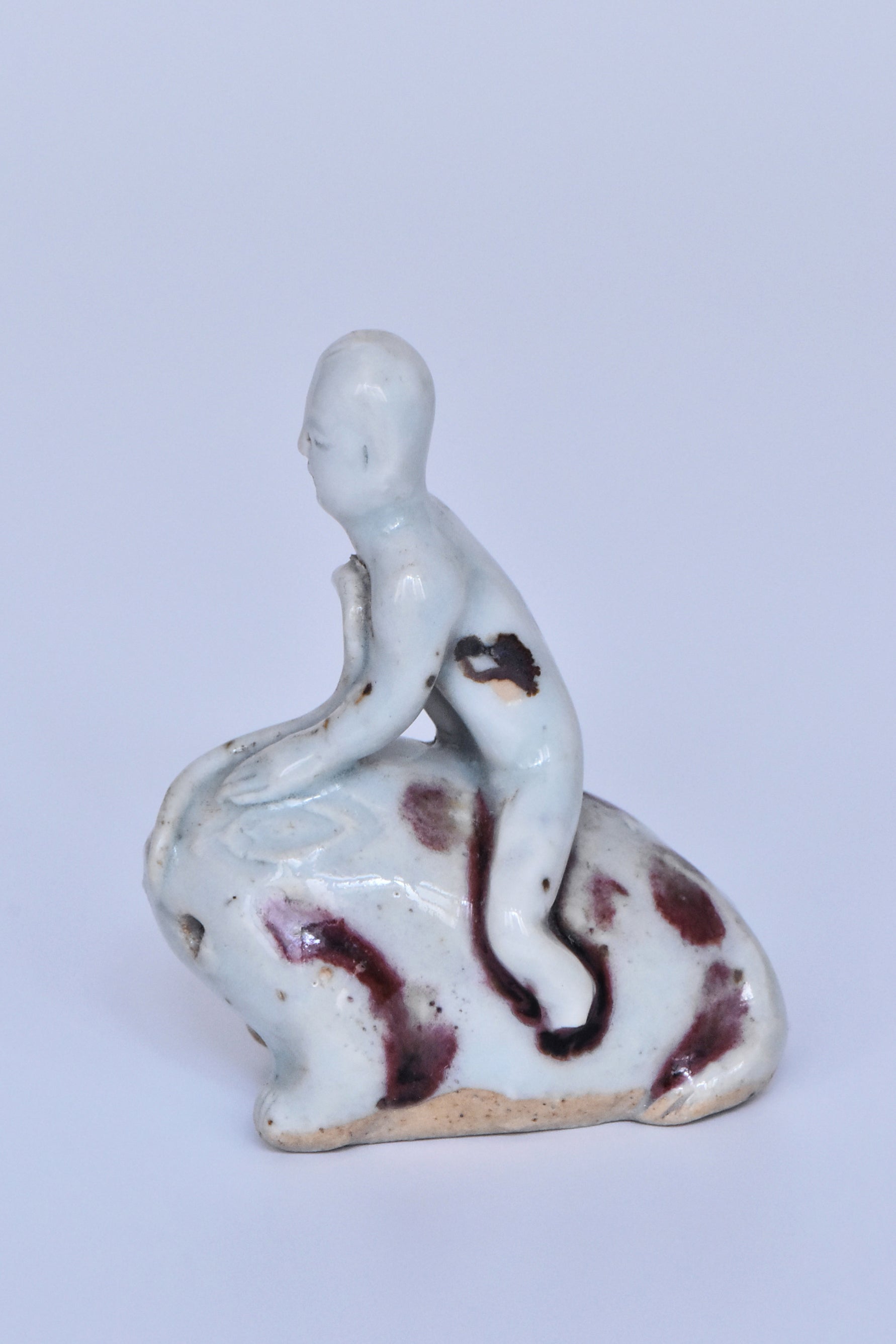 R346: Chinese Copper Red Decorated Figure of a Boy on a Frog Yuan Dynasty Style