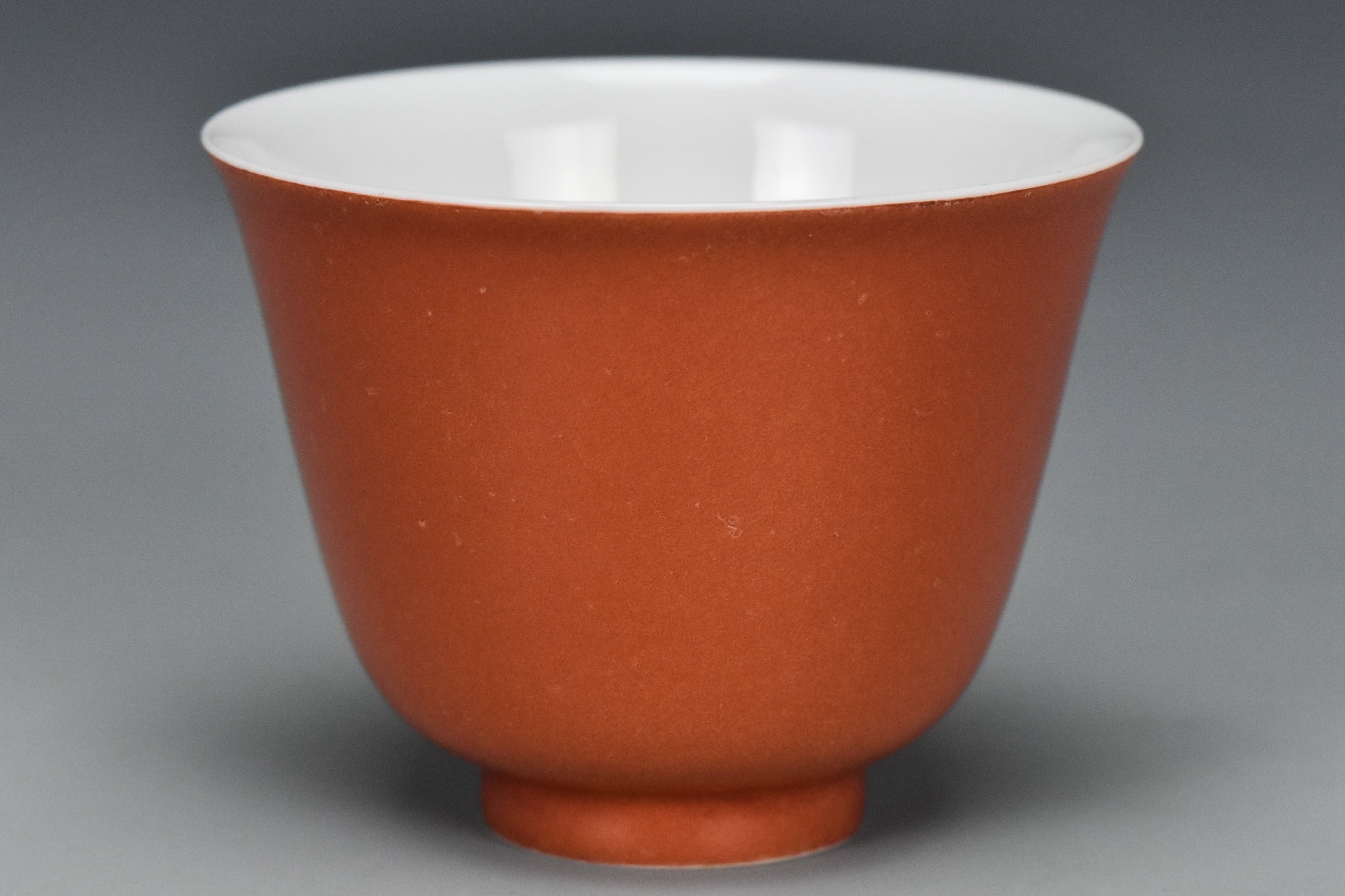 P240: A CHINESE QING DYNASTY STYLE CORAL RED GLAZED CUP KANGXI MARK