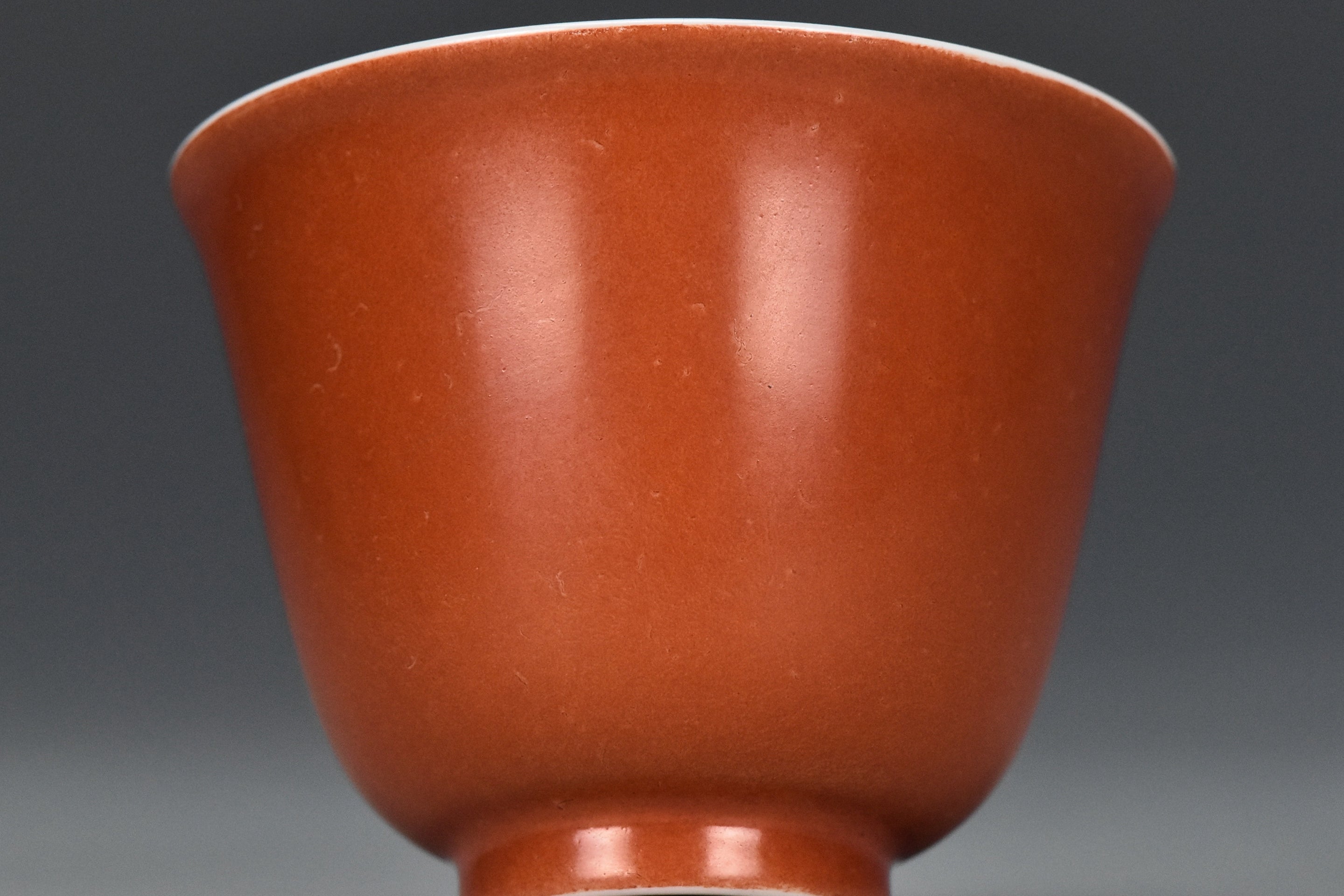 P240: A CHINESE QING DYNASTY STYLE CORAL RED GLAZED CUP KANGXI MARK