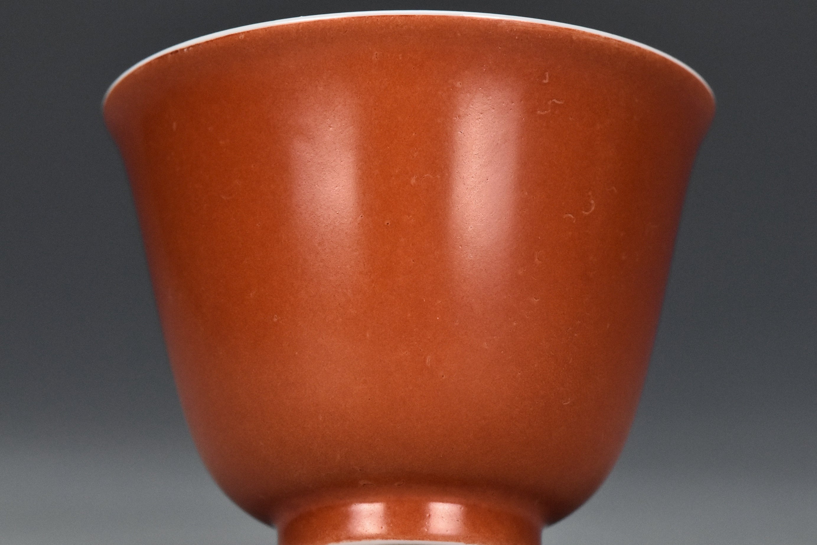 P240: A CHINESE QING DYNASTY STYLE CORAL RED GLAZED CUP KANGXI MARK