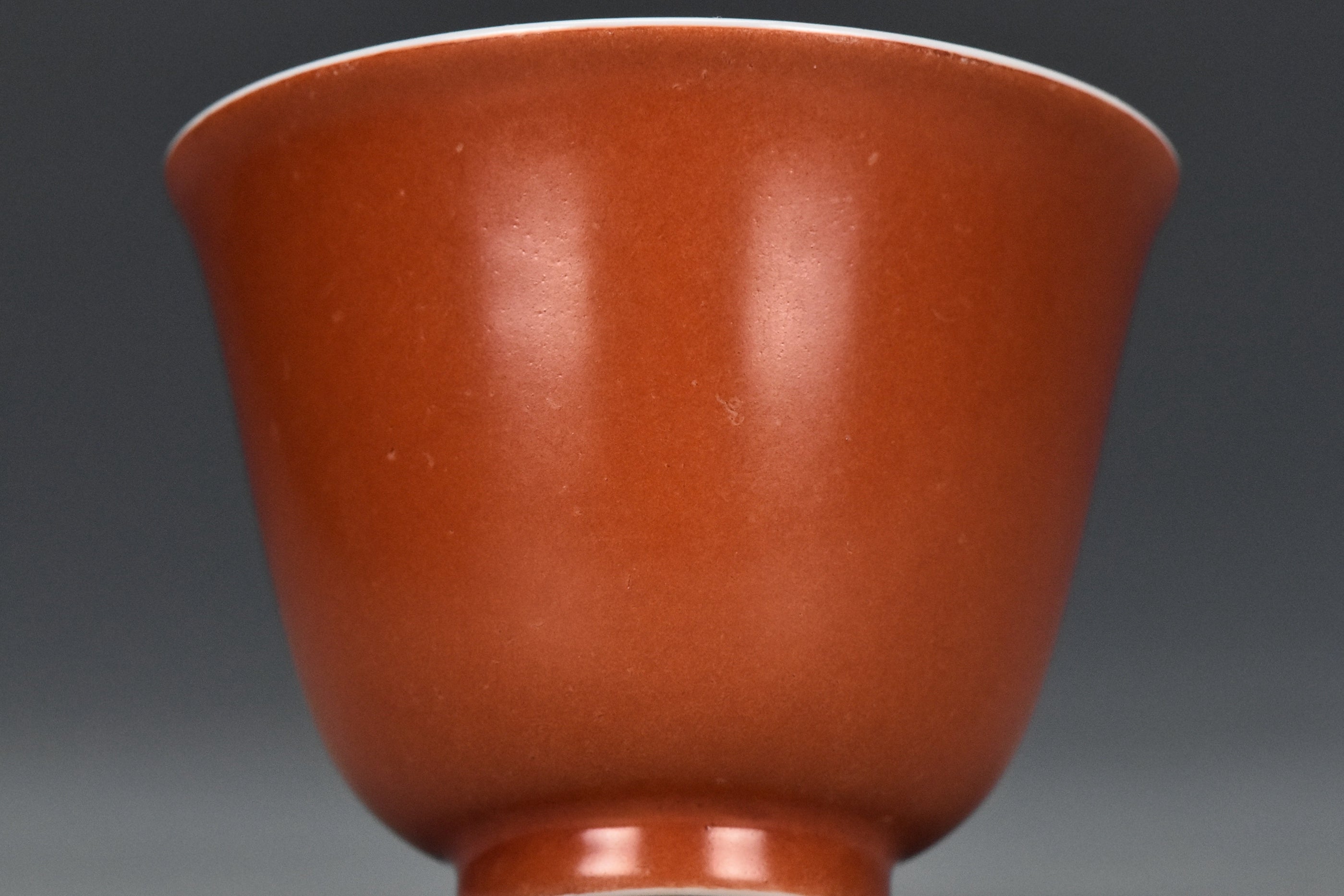 P240: A CHINESE QING DYNASTY STYLE CORAL RED GLAZED CUP KANGXI MARK