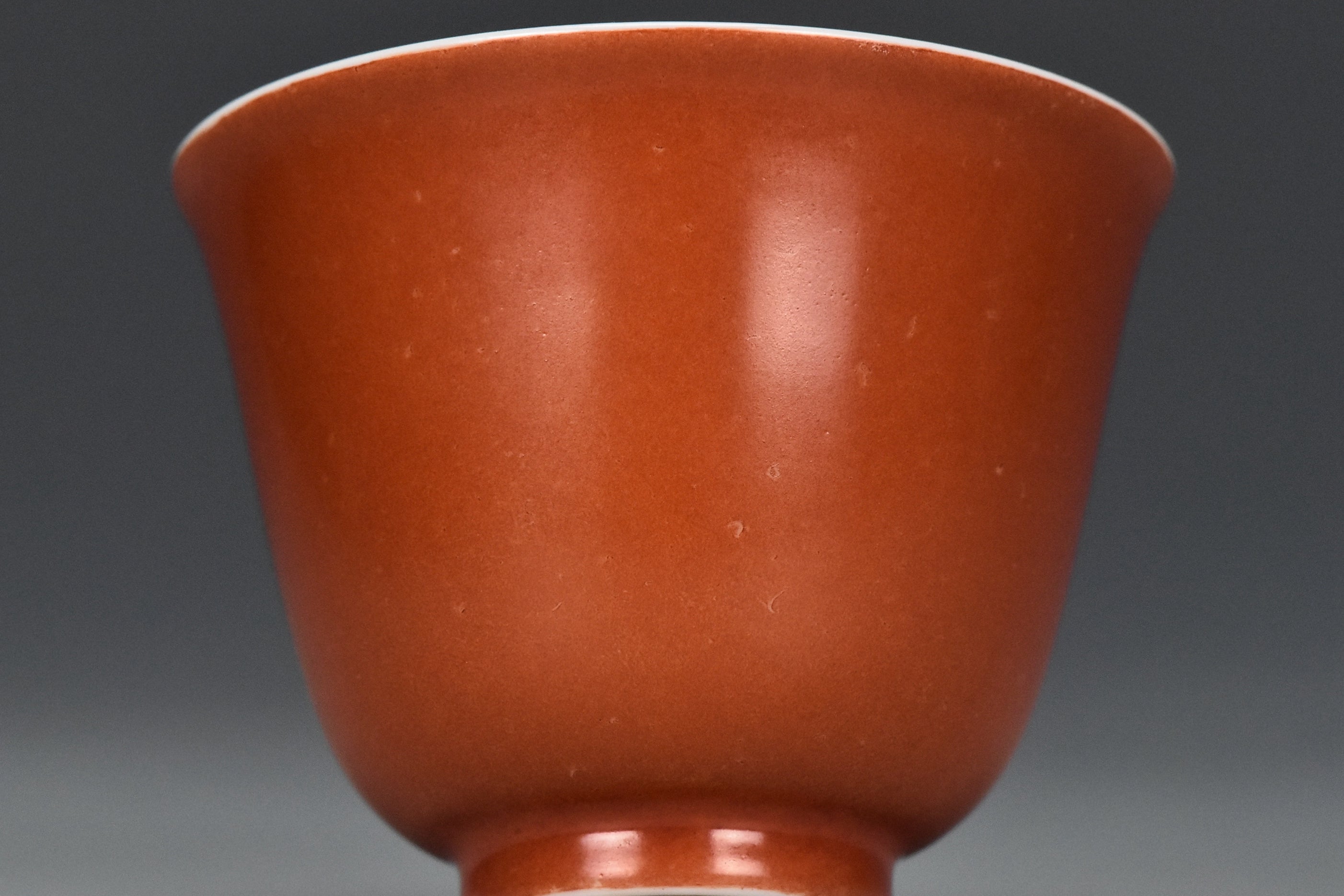 P240: A CHINESE QING DYNASTY STYLE CORAL RED GLAZED CUP KANGXI MARK