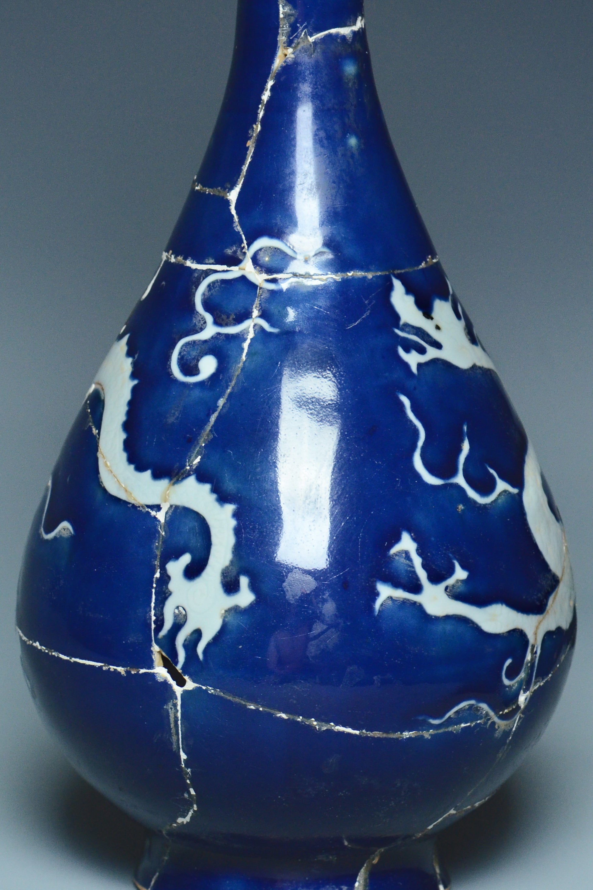 P279: A CHINESE YUAN DYNASTY STYLE BLUE GROUND DRAGON VASE