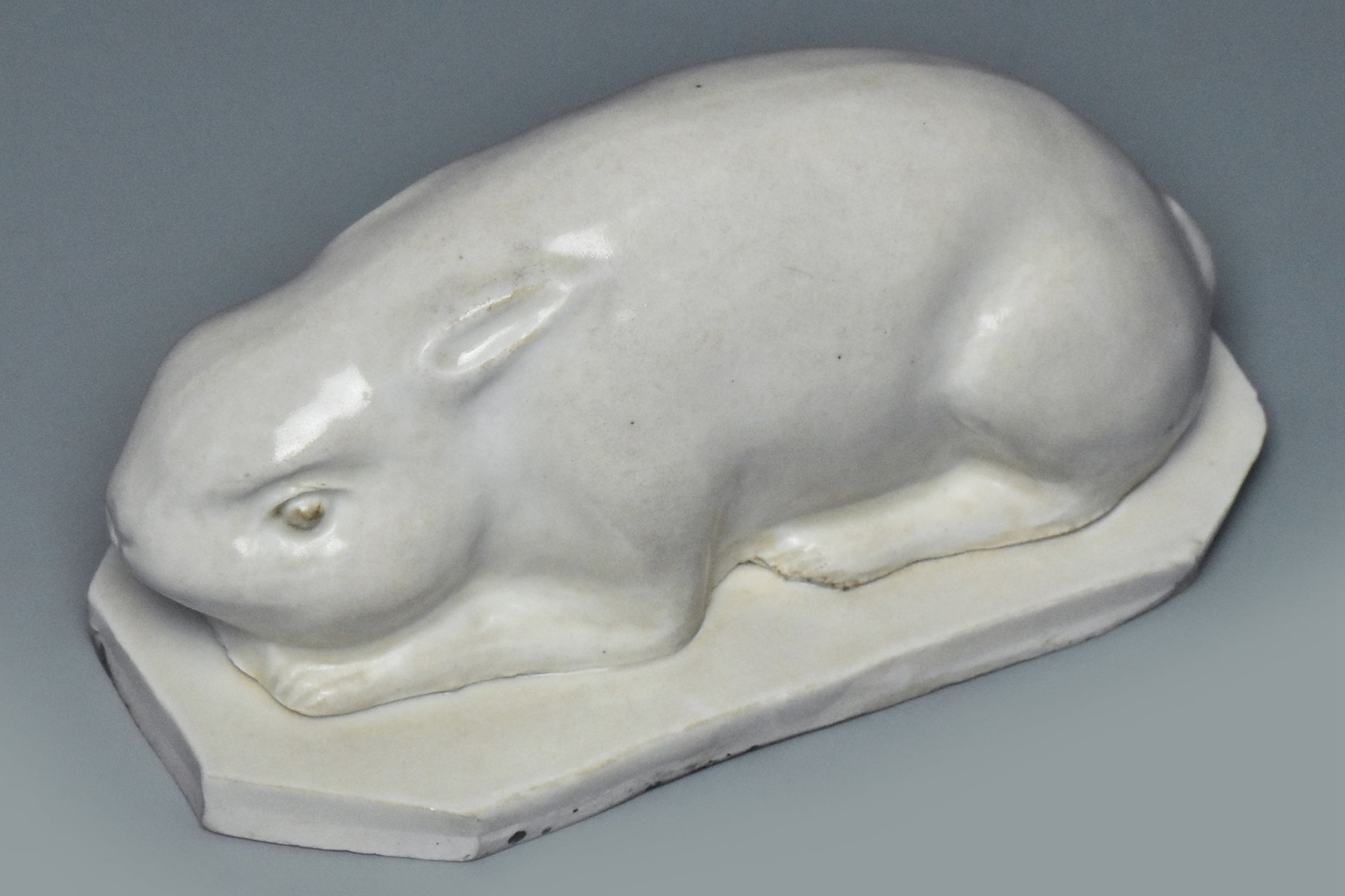 R019: A CHINESE SONG DYNASTY STYLE WHITE GLAZED RABBIT