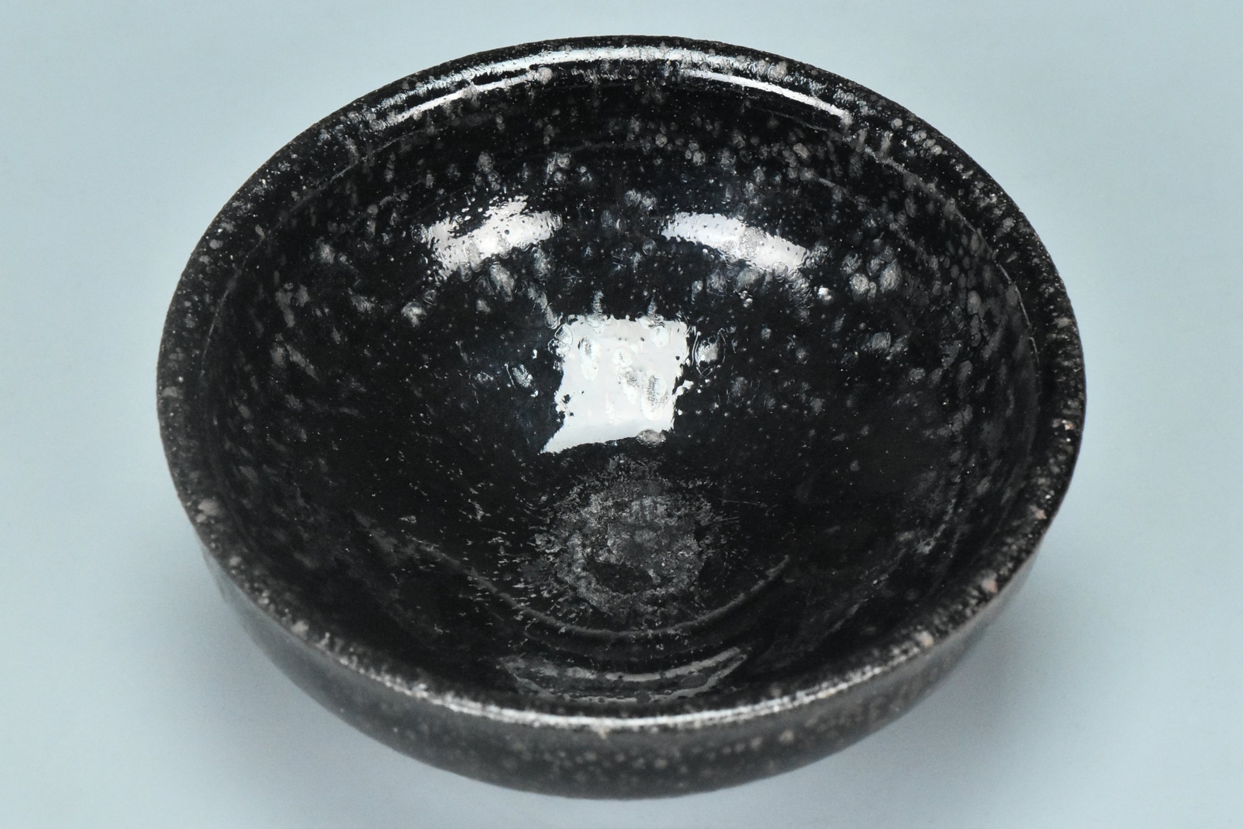 R109: A CHINESE JIN DYNASTY STYLE BLACK GLAZED OIL SPOT BOWL