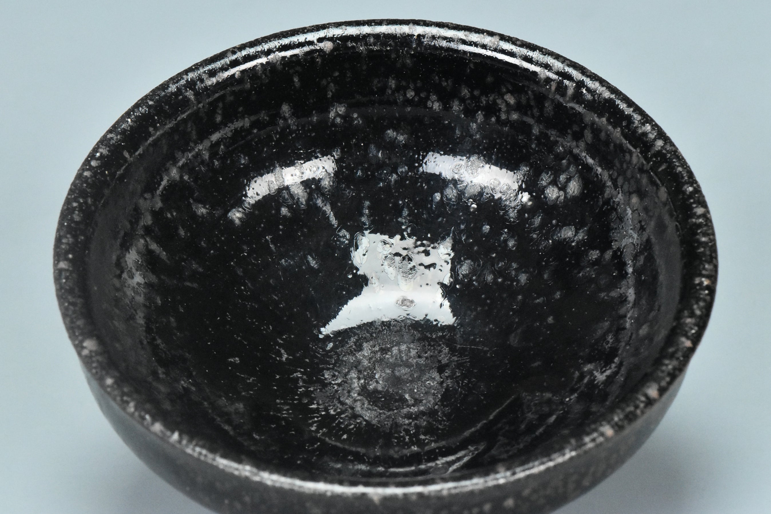 R109: A CHINESE JIN DYNASTY STYLE BLACK GLAZED OIL SPOT BOWL