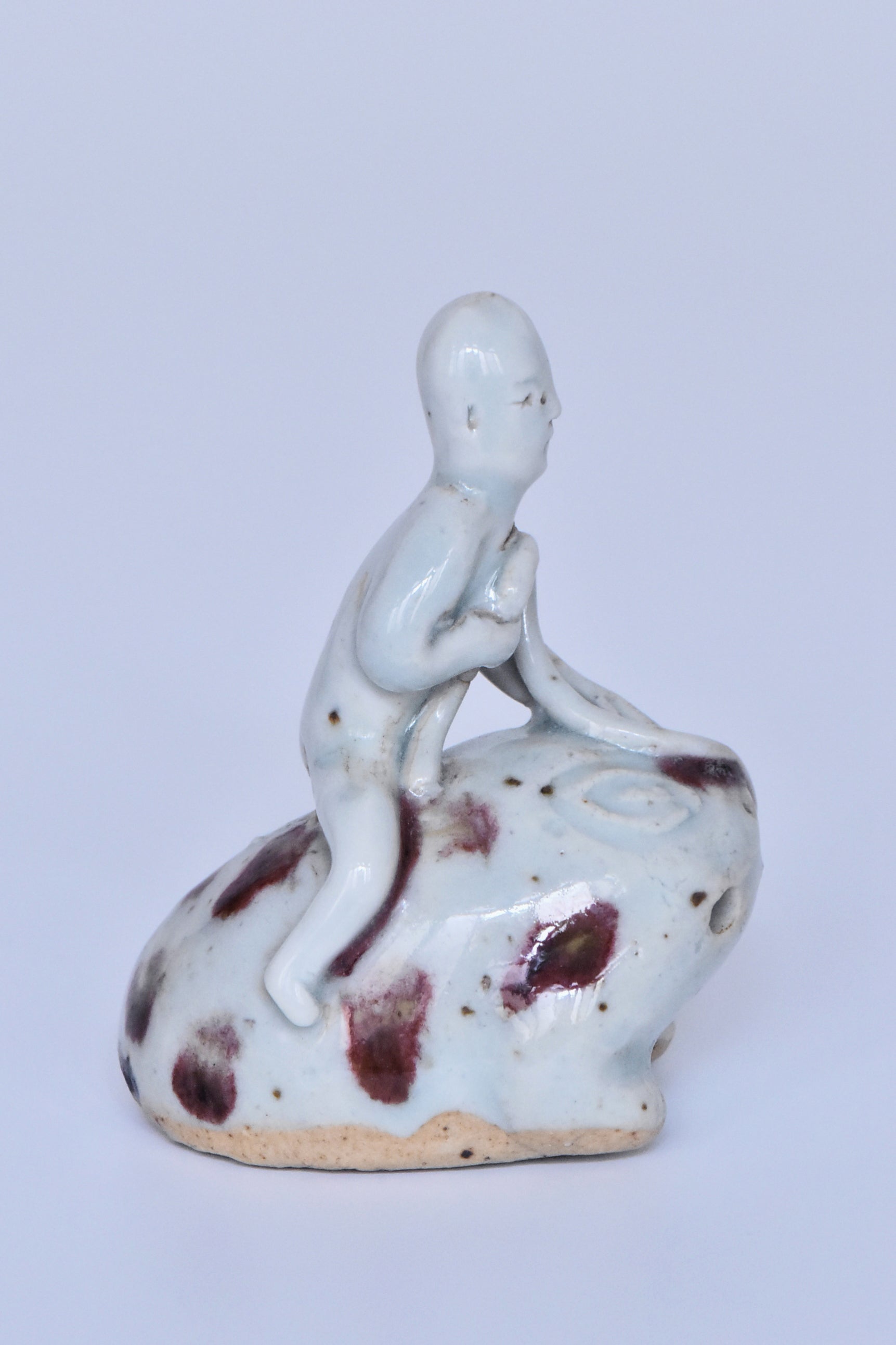 R346: Chinese Copper Red Decorated Figure of a Boy on a Frog Yuan Dynasty Style